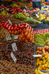 Fototapeta na wymiar Stalls of fruit and vegetables in greengrocer market stall.