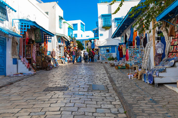 Fototapeta na wymiar Cityscape with typical white blue colored houses in resort town Sidi Bou Said. Tunisia.