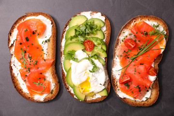bread slice with avocado and salmon