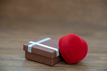 a gift of lovers for Valentine's day beautiful hearts background box ribbon