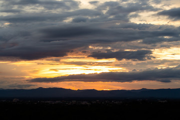 colorful dramatic sky with cloud at sunset.