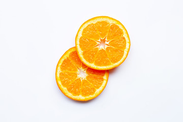 Fresh orange citrus fruit slices on white