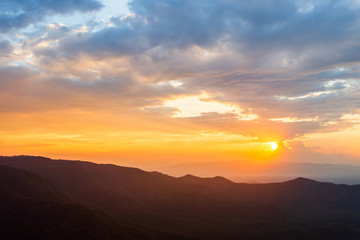 colorful dramatic sky with cloud at sunset.