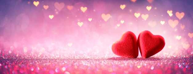Two Hearts On Pink Glitter In Shiny Background - Valentine's Day Concept
 - obrazy, fototapety, plakaty