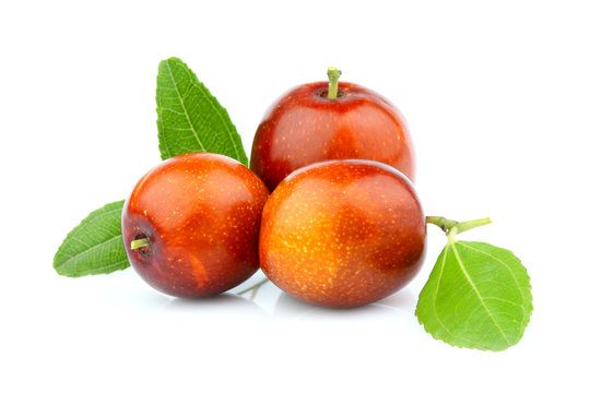 Jujube (Ziziphus) fruits with leaves.