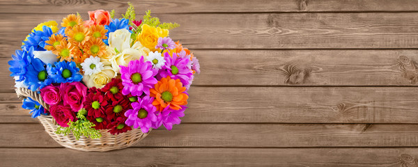 Flowers and wooden background