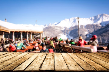 Winter table background in Alps and mountains landscape 