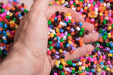  a hand full of iron beads