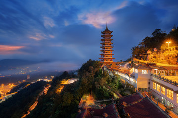 View of Pagoda of the Chinese Chin Swee Caves Temple, Genting Highlands, is a famous public tourism spot in Malaysia. Chin Swee Caves Temple is a Chinese Buddhist taoist temple - obrazy, fototapety, plakaty