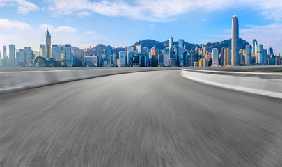 Fototapeta premium Air highway asphalt road and office building of commercial building in modern city