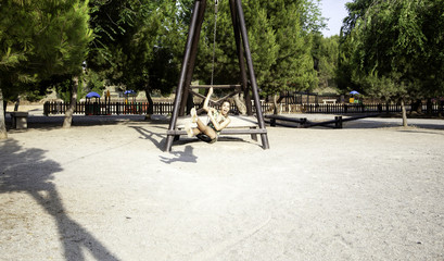 Woman jumping on zip line