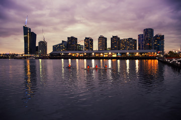 Fototapeta na wymiar Night kayaking at Dockland in Melbourne, Australia