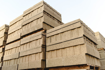 Stack of cement blocks to build houses and buildings stacked on a pallet.