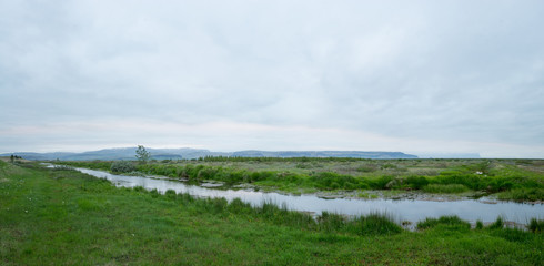 Fototapeta na wymiar Panoramic landscape near the village Kirkjubaearklaustur