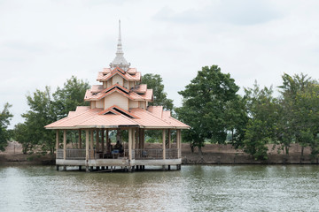 Fototapeta na wymiar Pavilion in the water at Wat Chedi Hoi, The Oyster Shell Temple