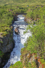 Fototapeta na wymiar The Bjoreio River with bridge just before the Voringfossen
