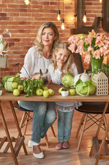 Cute girl and mother playing with rabbit. Easter card template. Happy easter. Baby with rabbit or hare. Easter Child. Spring card, calendar template. Easter Family with bunny or rabbit. 