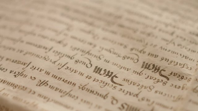 Old paper cryptic writing medieval latin