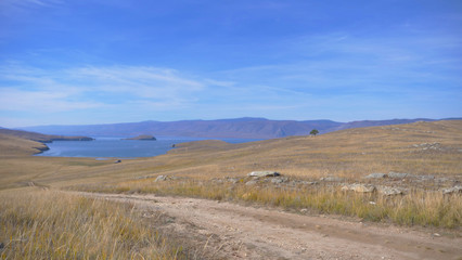 Fototapeta na wymiar Beautiful view of Lake Baikal Olkhon Island in a sunny day, Irkutsk Russia.
