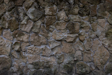 Wall of natural stone. Texture for background and design.	