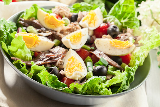 Nicoise Salad with tuna, anchovy, eggs and tomatoes