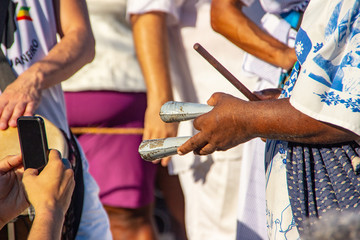 detail of musical instrument during the feast of Iemanjá in Copacabana in Rio de Janeiro