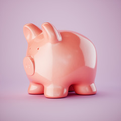 Pink piggy bank isolated on pink background