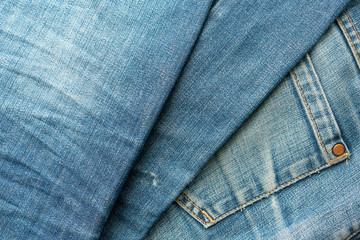 Fototapeta premium Blue jeans pile. Denim Texture.
