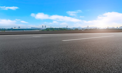 Empty asphalt road square and natural landscape under the blue sky