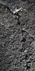 Dark light stones surface texture.