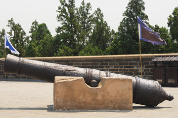 The first pass under heaven. The ancient gun on the Great Wall. Qinhuangdao, ancient town, Great Wall, China