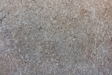 The walls of the house are created from natural soil. Clay house made of clay, straw, and husk.