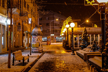 Streets of the town at night covered with snow. Kragujevac town in Serbia.