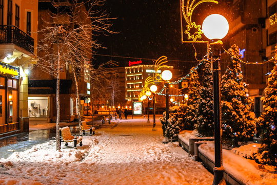 Streets of the town at night covered with snow. Kragujevac town in Serbia.
