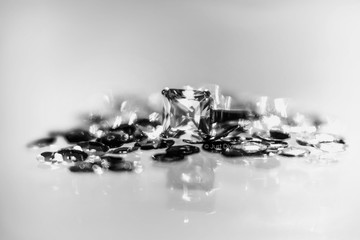 pile of sequins with a diamond ring