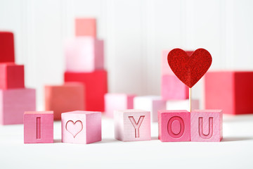 I Love You message with pink and red blocks with hearts