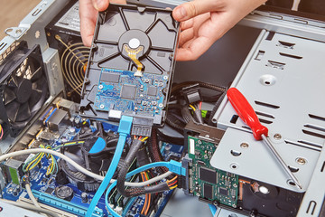 Installation of hard drive in personal computer.