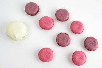 Obraz premium Sweet colorful macaroons on a white background.