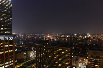 Obraz premium Aerial view of MIT campus on Charles River bank at night, Boston, Massachusetts, USA 