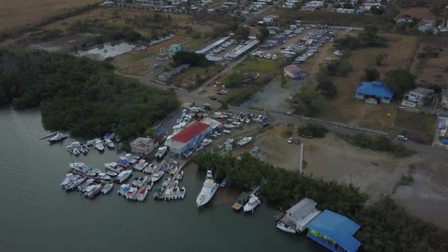 AERIAL, a group of boats almost piled on top of each other in a small dock, in Puerto Rco.