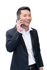 Isolated asian businessman in suit  using mobile phone on white background in businesss concept