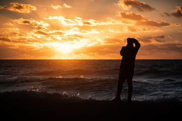 silhouette of a man at sunset