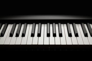 Piano keyboard on black background