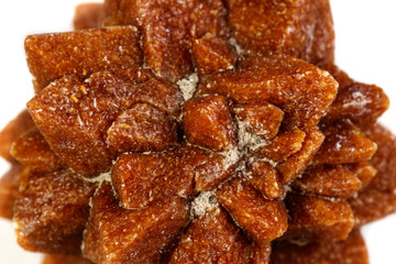 Macro mineral stone Ikaite on a white background