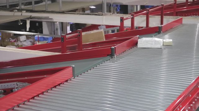 Conveyor Sorting in Distribution Warehouse Shipping Delivery