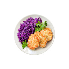 Chicken fritters and stewed red cabbage with caraway seeds isolated on white background with clipping path