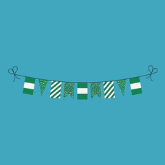 Decorations bunting flags for Nigeria national day holiday in flat design. Independence day or National day holiday concept.
