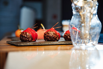 Handmade cakes drizzled red icing