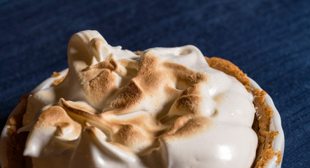 Close macro shot of the crisped top of a home made gluten free lemon meringue pie