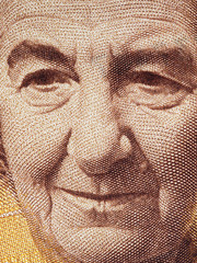 Golda Meir portrait on Israeli banknote extreme macro. Prime minister of Israel..
